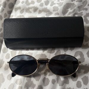 Prada Gold Frame Sunglasses with Black Lenses
